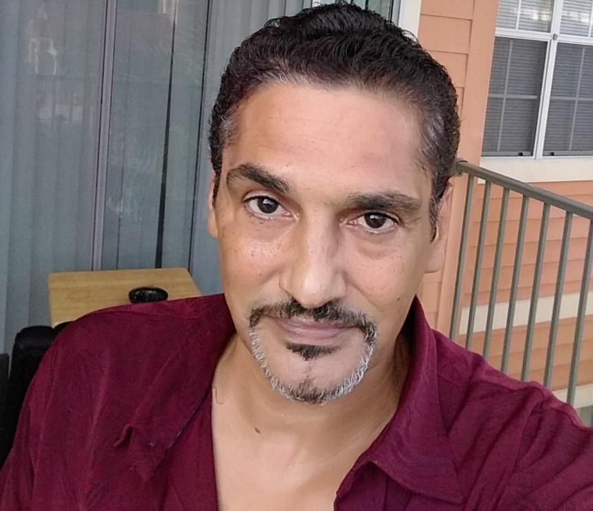 A person taking a selfieDescription automatically generated