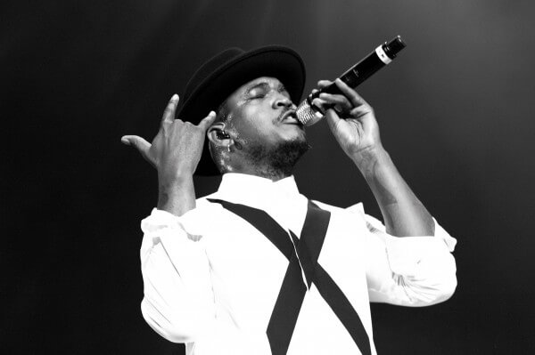 LOS ANGELES, CA - JUNE 26:  (EDITORS NOTE: Image was shot in black and white. Color version is not available.) Rapper Ne-Yo performs onstage during the Nicki Minaj, Ne-Yo, Tinashe, Rae Sremmurd concert at Staples Center on June 26, 2015 in Los Angeles, California.  (Photo by Earl Gibson/BET/Getty Images for BET)