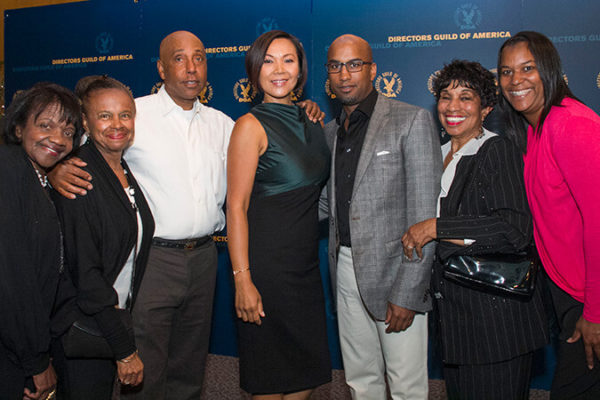  Tim Story poses with Vicky Mara Story and  other members of his family 