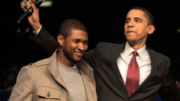 ORANGEBURG, SC - JANUARY 22: (FRANCE OUT) Presidential candidate Barack Obama (R) stands with entertainer Usher (L) at a campaign event at South Carolina State University January 22, 2008 in Orangeburg, Carolina. Obama is campaigning through the state ahead of its Democratic primary on January 26.  (Photo by Chris Hondros/Getty Images)