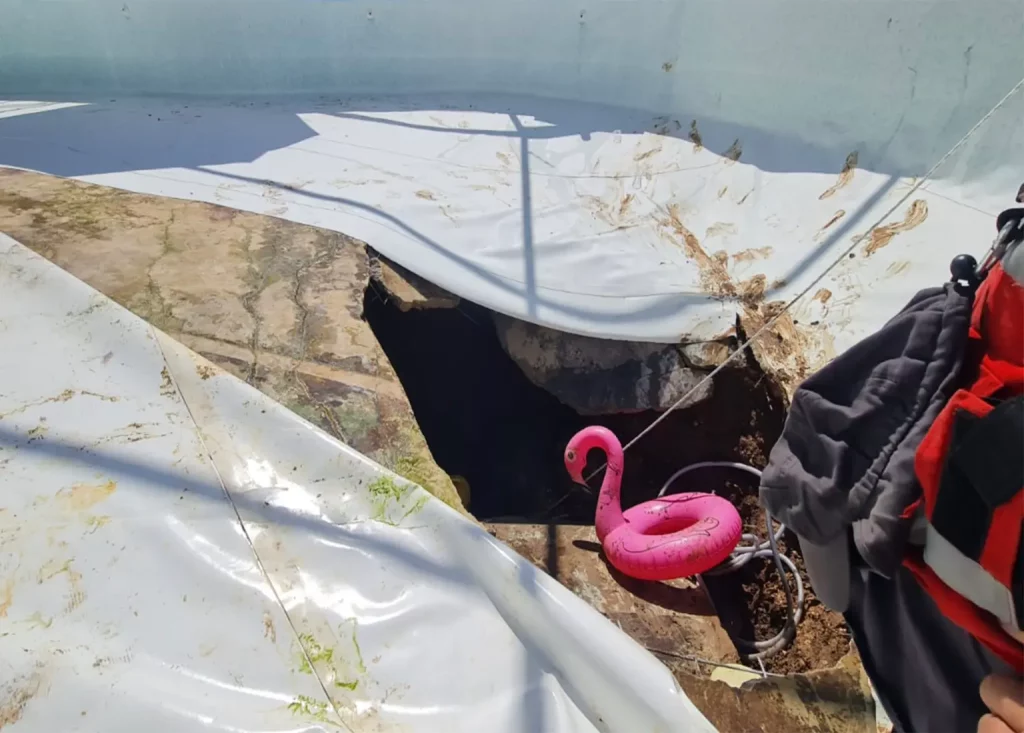 Giant Sinkhole at Pool Kills Man and Injures one Other