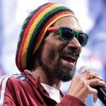 Snoop Lion posing for Overstock.com advertisement