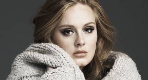Adele celebrating her record-breaking album sales